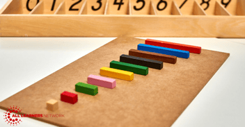 Math manipulatives spread out on a desk