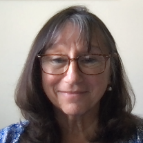 A headshot portrait of Sandi Stanhope