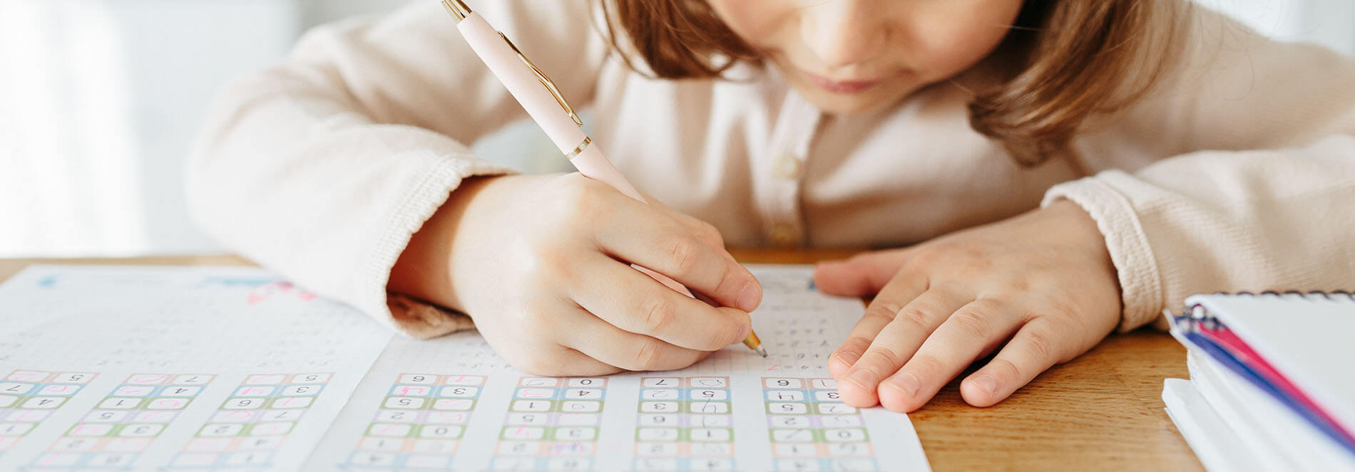 cute-preschooler-girl-writing-maths-learning-home-2021-09-01-19-42-43-utc