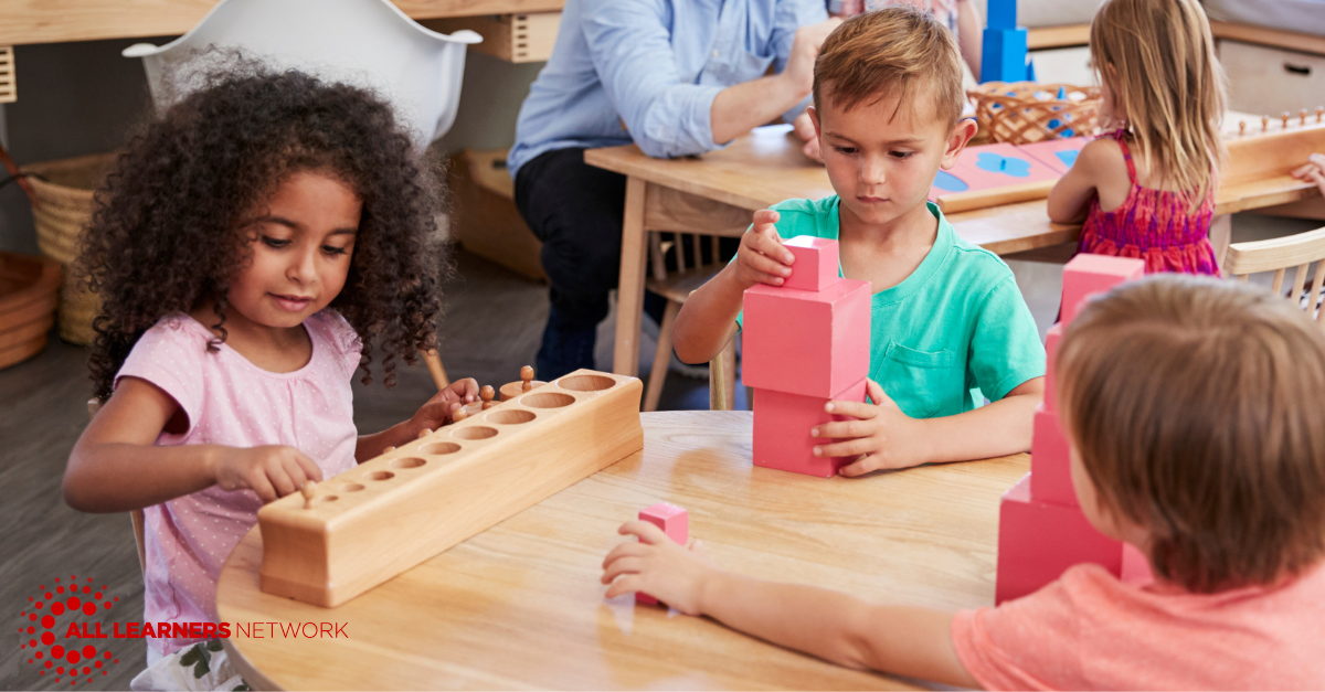 Students sitting together with math manipulatives