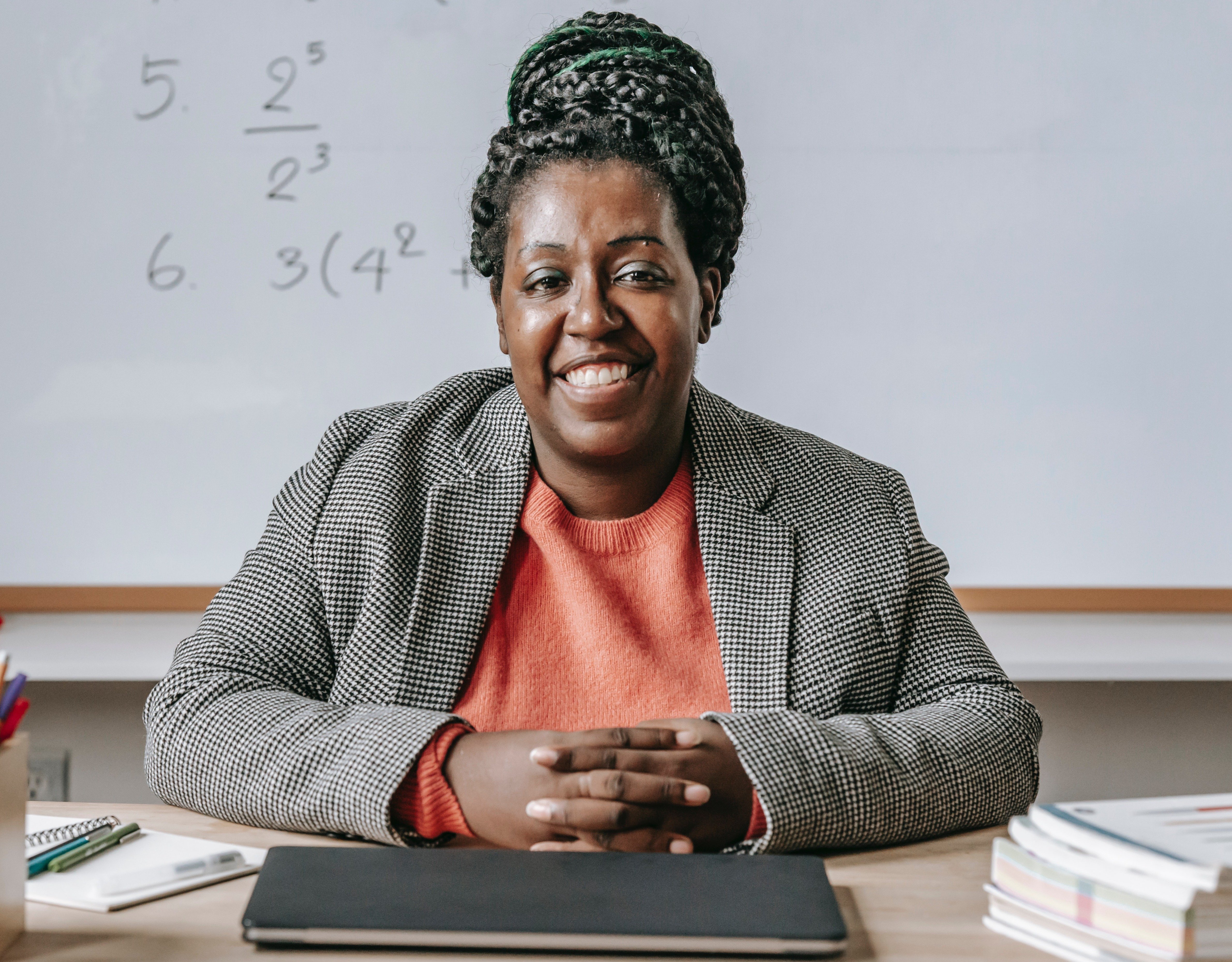 black-teacher-in-math-classroom black-teacher-in-math-classroom